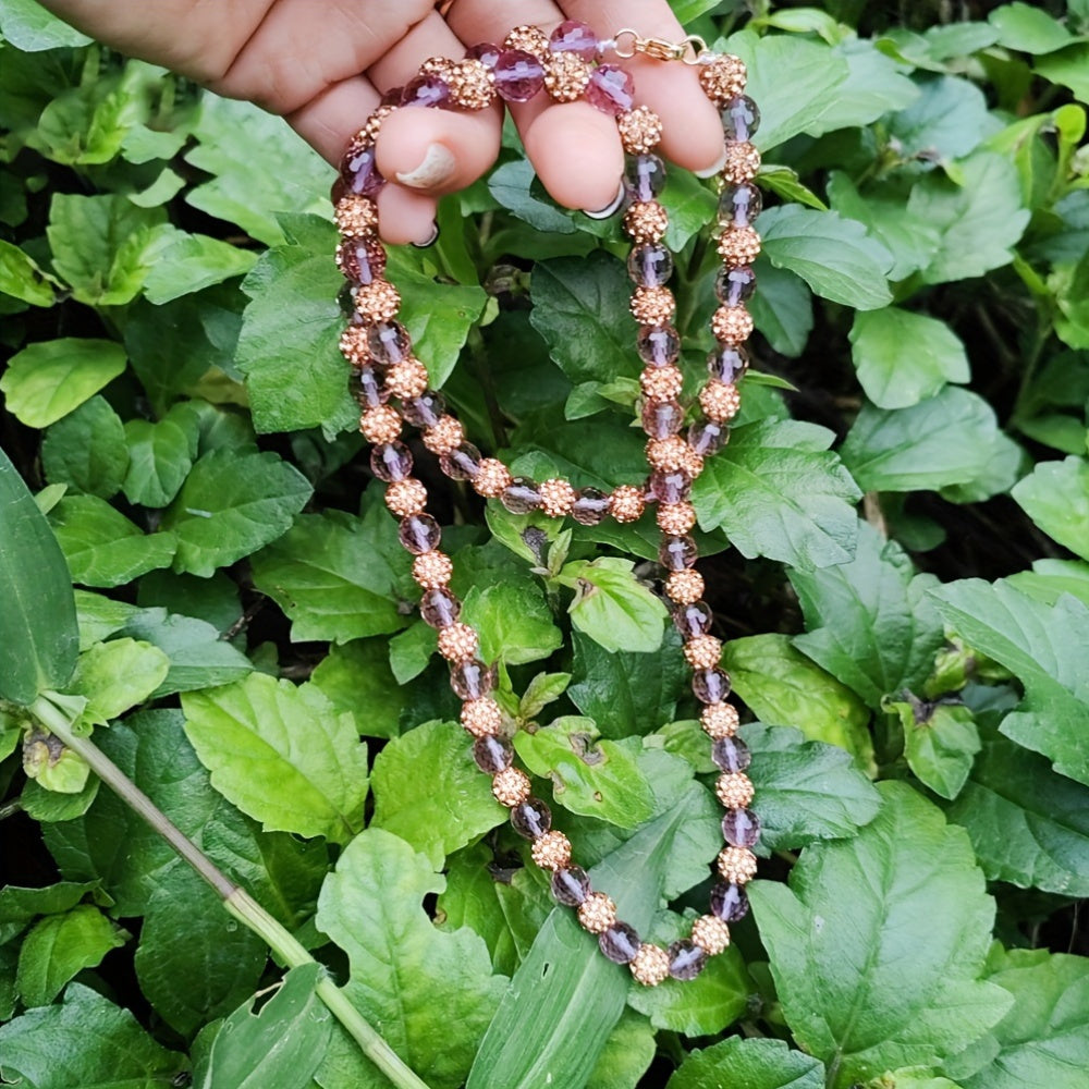 This sophisticated beaded necklace features stunning color-changing synthetic Sultanite Diaspore, unadorned by plating. It is a versatile piece of jewelry perfect for both everyday wear and special occasions.