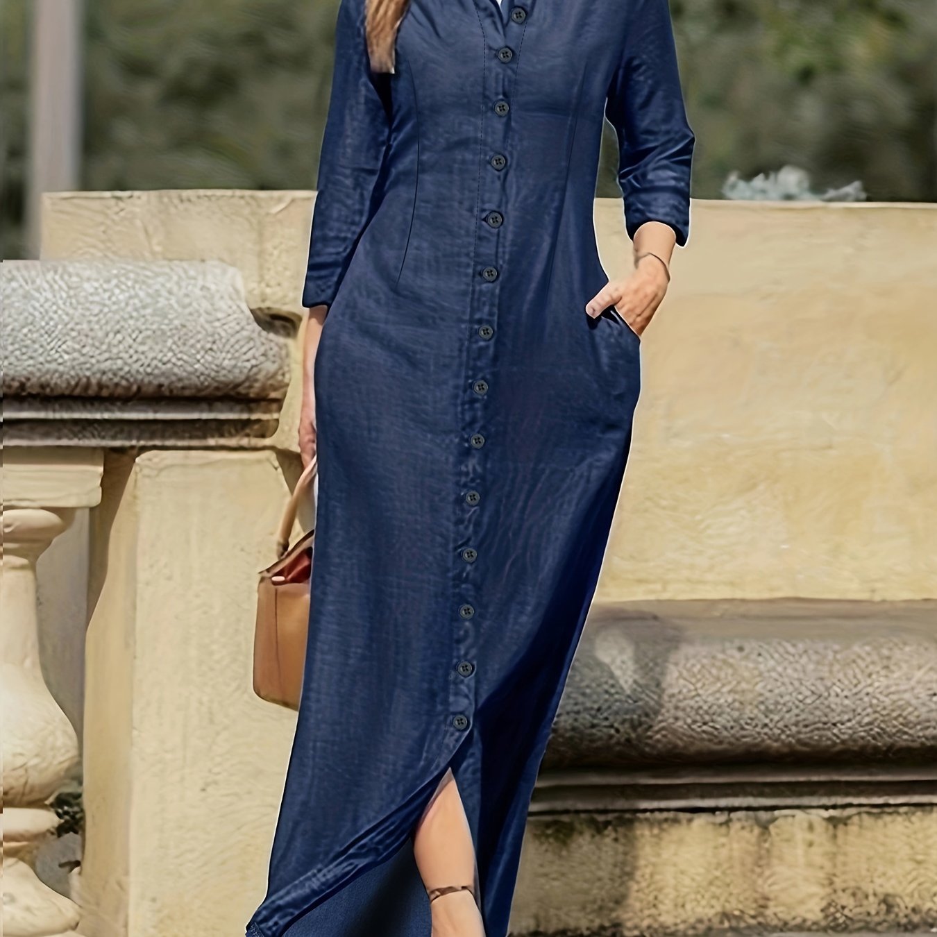 Solid maxi dress with button front, long sleeve and collar.