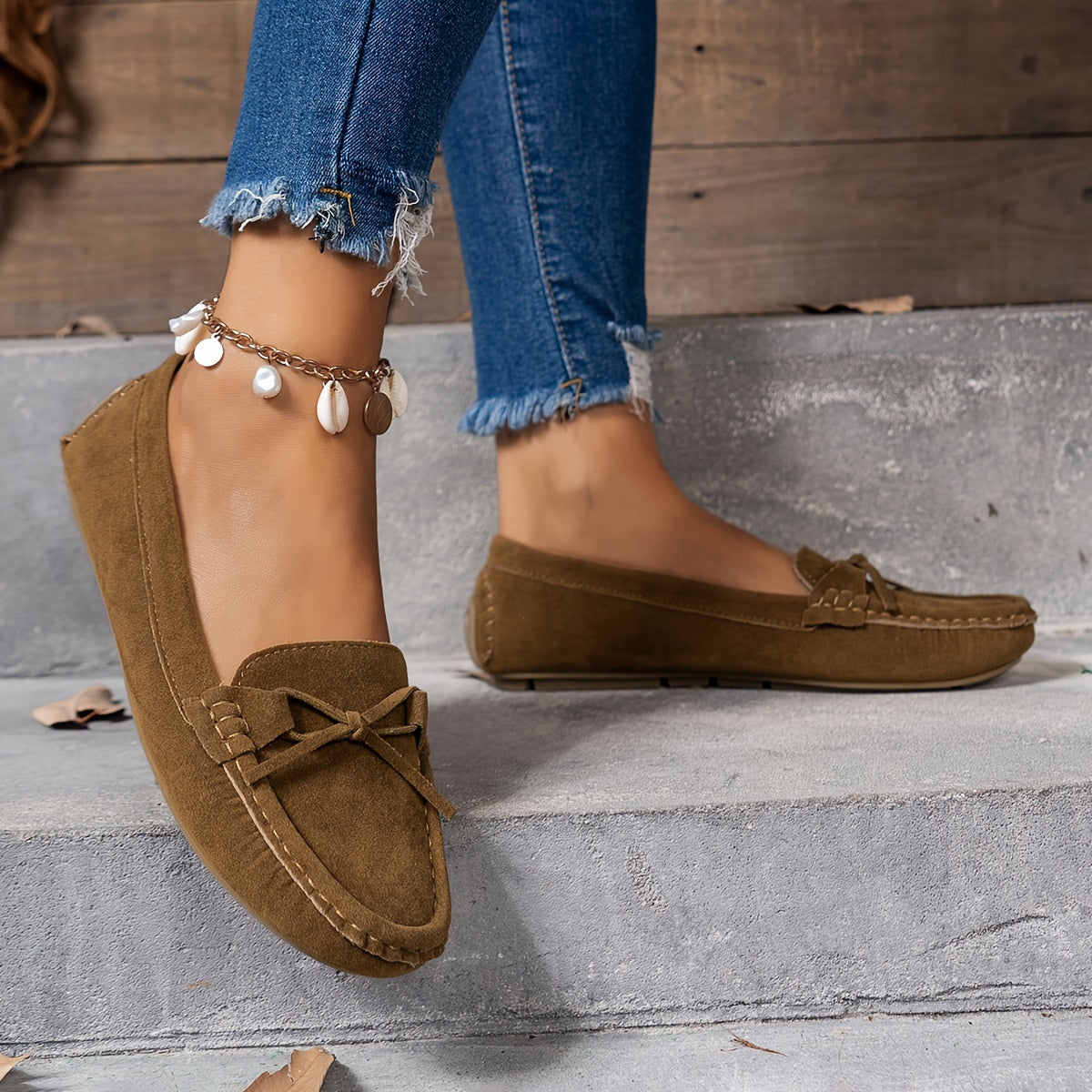 Retro flat loafers with bow detail, slip on style, and soft sole for casual wear.