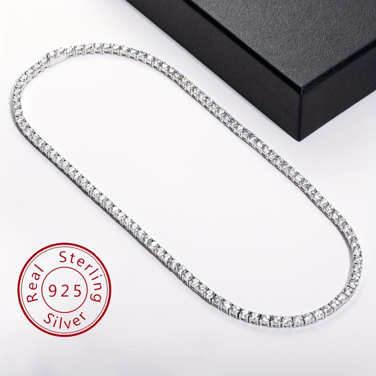 This exquisite Cuban hip hop fashion necklace features a 4.0mm mixed row of Moissanite stones set in 925 sterling silver. Available in 18, 20, 22, and 24 inch lengths, with 106, 118, 129, and 142 pieces respectively. Weighing approximately 38.5 grams