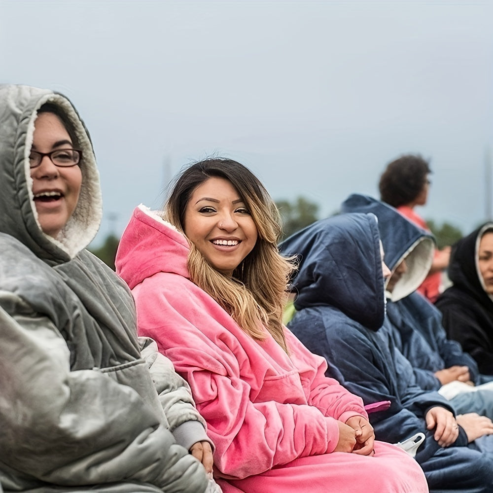 Perfect for gift-giving this Christmas, this Ultra-Soft Reversible Sherpa Fleece Hoodie Blanket features a cozy wearable design with a Kangaroo Pocket. Stay warm and snuggle up in this Machine Washable sweatshirt.