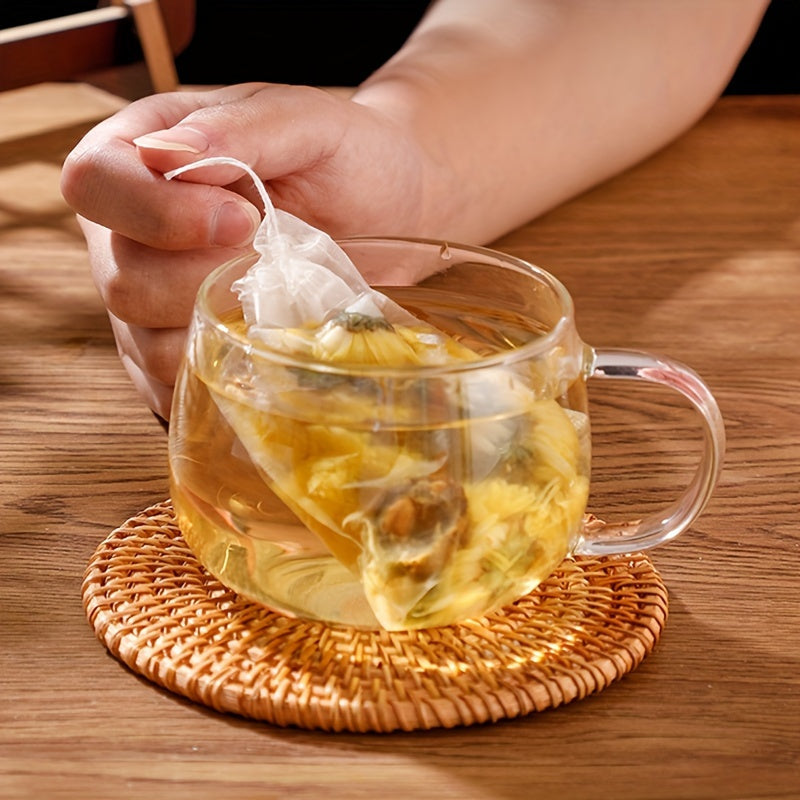 100 pieces of Disposable Drawstring Tea Bags for Loose Leaf Tea, perfect for use in restaurants, hotels, family gatherings, theme parties, weddings, and birthday parties.