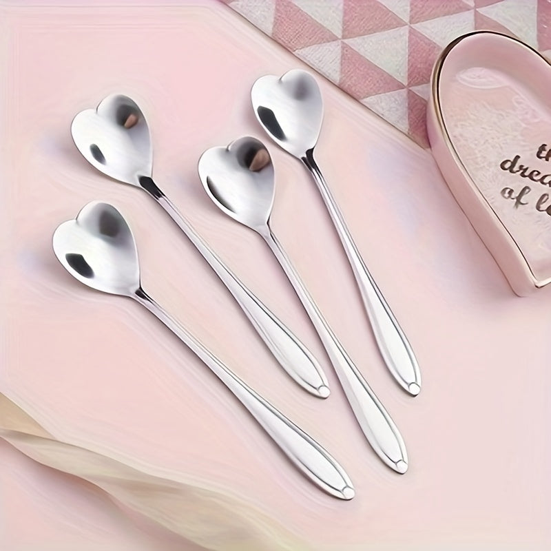 Celebrate love with 2 stainless steel coffee spoons shaped like hearts, the perfect gift for Valentine's Day. These creative spoons are perfect for stirring desserts and are ideal for Christmas parties, holidays, restaurants, and home use.