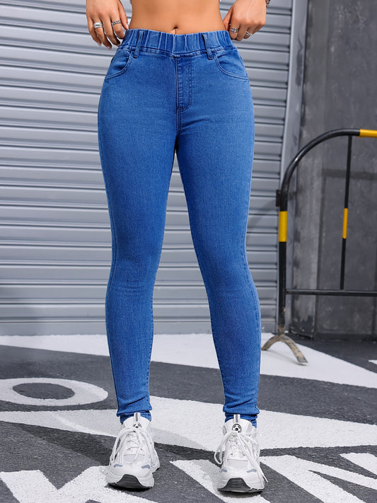 Stretchy skinny jeans for women, versatile for all seasons, in solid washed denim with polyester and elastane.