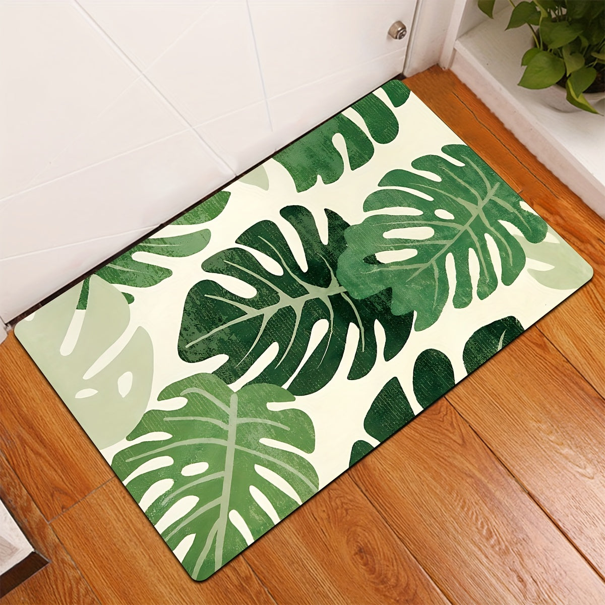 Green Plant Pattern Soft Area Rug, made of modern style polyester with a thick and luxurious rectangular design. Ideal for living rooms, bedrooms, kitchens, and indoor decor. This absorbent rug features a non-slip mat and foam pad for added comfort.