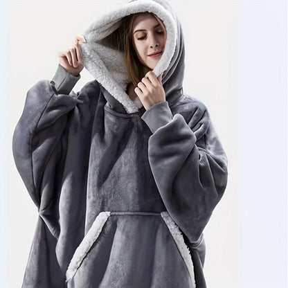 A cozy wearable blanket with a big pocket, perfect for giving as a Christmas gift to men and women. It is super soft, warm, and comfortable.