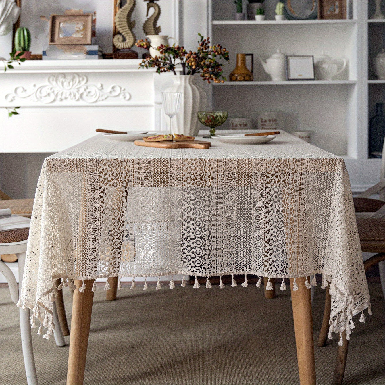 Bohemian chic crochet lace tablecloth, ideal for dining and parties. Rectangular polyester design with a farmhouse style, perfect for boho home decor. Great for buffet tables, banquets, and serving western food.