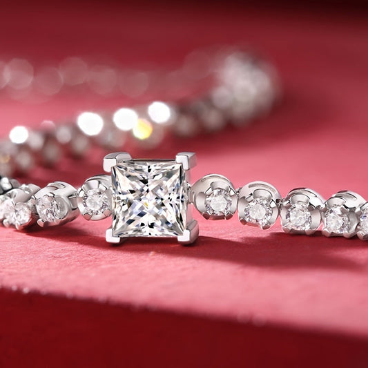 Sparkling with pure elegance, this 925 sterling silver Moissanite tennis bracelet features a dazzling display of shiny round-cut Moissanite stones, making it the perfect accessory for weddings, banquets, and special occasions. Give it as an anniversary