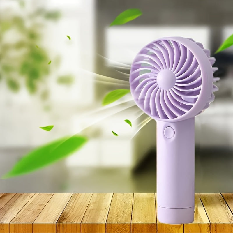 Ideal for both indoor and outdoor use, this portable handheld fan features a 3-speed setting and a 400mAh USB rechargeable battery. With a wearable electric design and button control, this mini fan is made of durable plastic material. It makes the