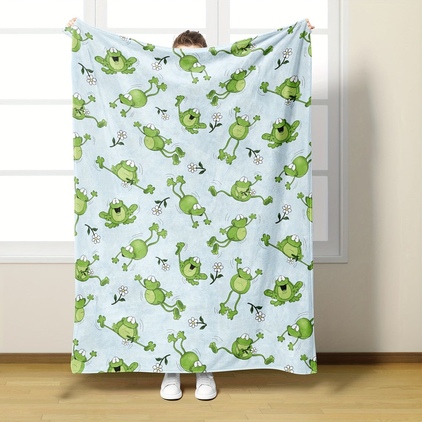 Soft and cuddly, this adorable frog-patterned flannel throw blanket is perfect for all seasons. Its skin-friendly polyester cover and lining provide ultimate comfort, while the contemporary digital print adds a touch of style to any room. The knit weave