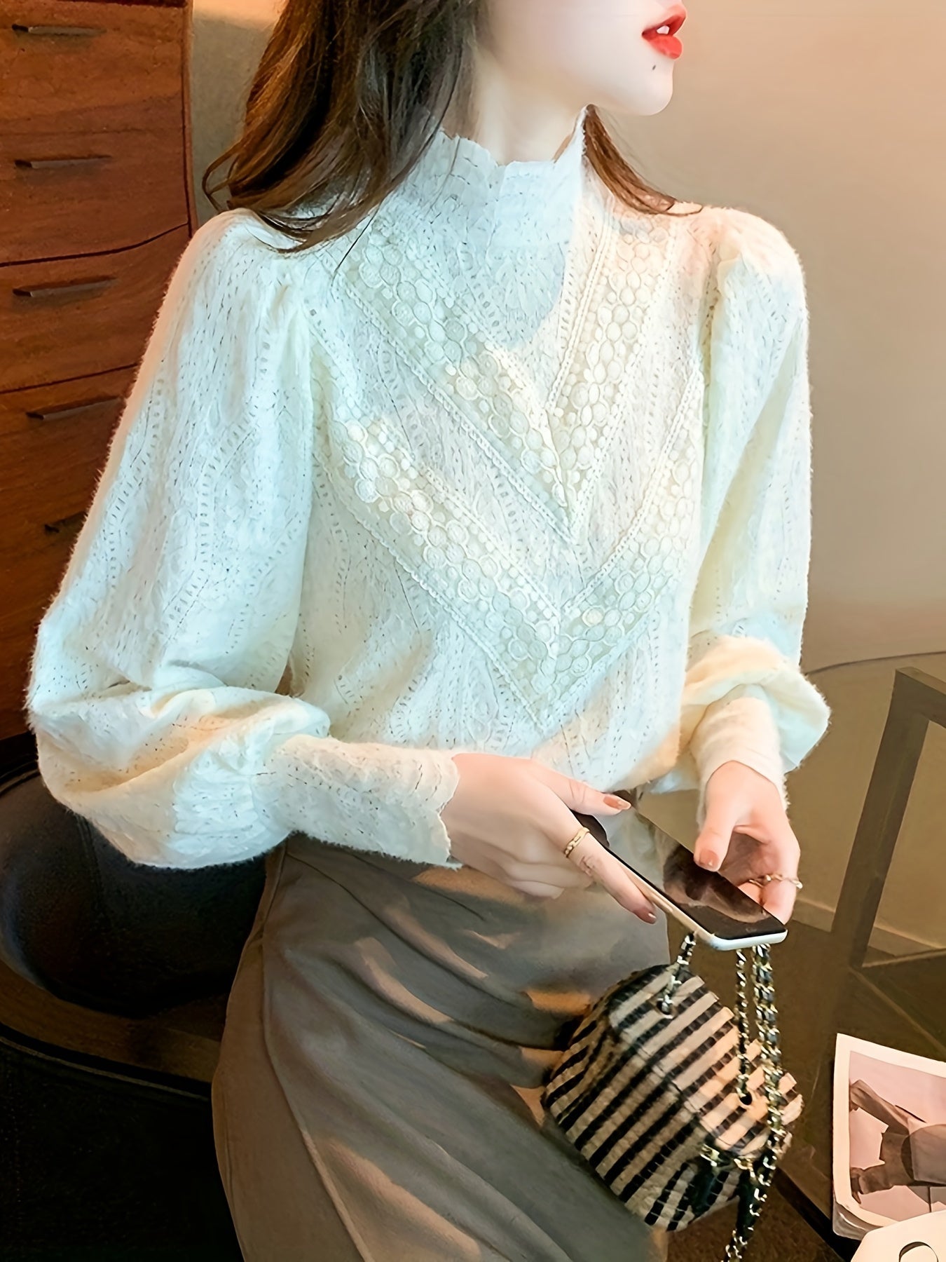 French Court-inspired lace blouse with mock turtleneck, made of nylon and spandex. Machine washable, ideal for spring/fall.