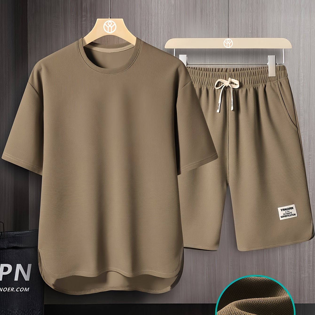 Men's summer short sleeve suit with high-end solid color round neck t-shirt and breathable thin shorts in a two-piece set called AWESOME BIRD.