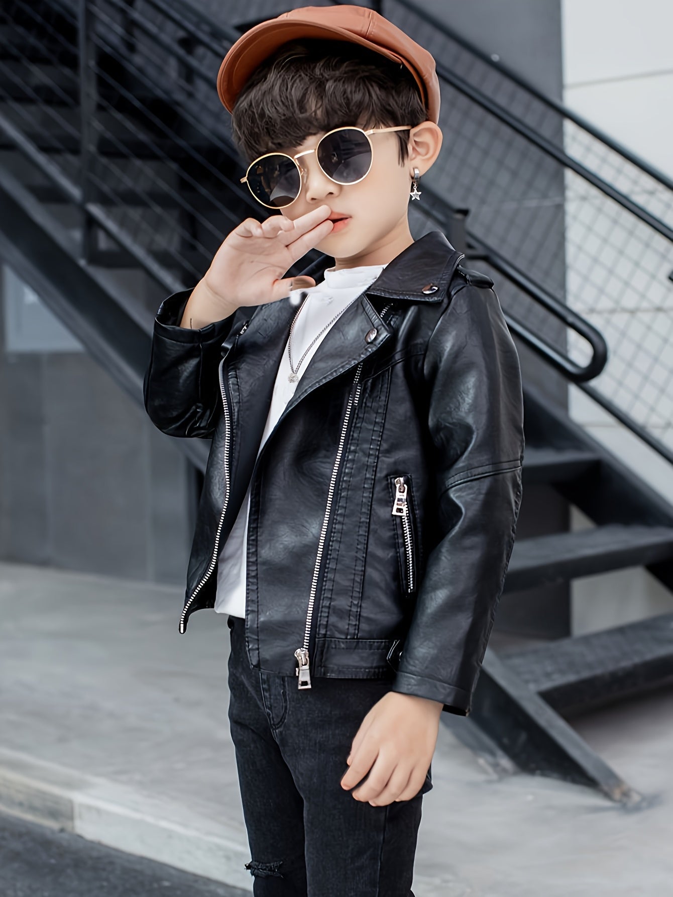 Kids' loose fit polyester jacket with lapel collar, solid color, long sleeves, and zipper detail. Suitable for all seasons.