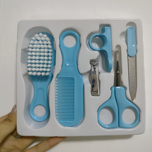 Set of 6 pieces, including a comb, brush, nail clipper, scissors, and manicure pedicure tool.