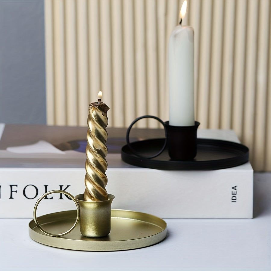 Stylish metal candle holder for table decor at home, ideal for dinner parties and special occasions.