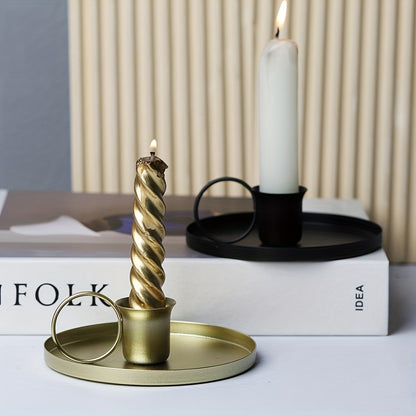 Stylish metal candle holder for table decor at home, ideal for dinner parties and special occasions.