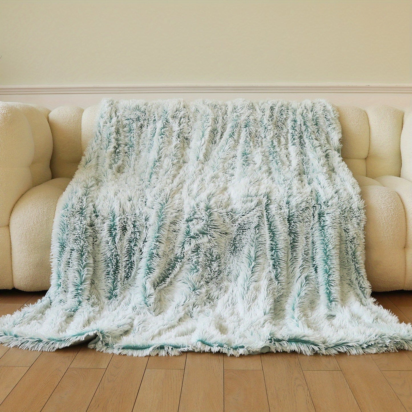 Soft and comfortable double-layer plush sofa blanket, perfect for keeping warm and cozy in your office, on the couch, bed, or during a nap. Ideal for both home and office use.