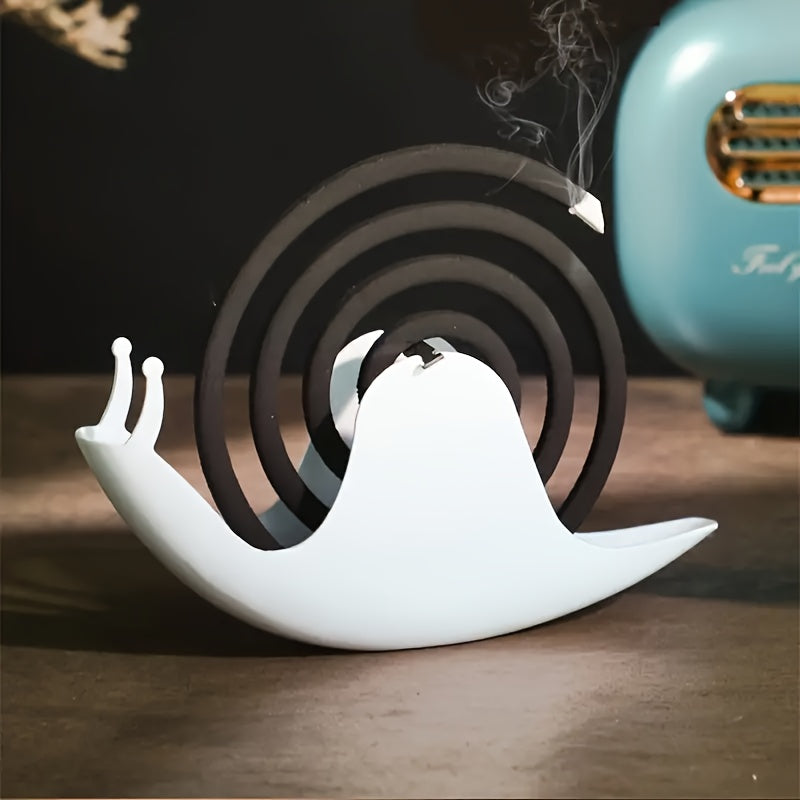 Unique whimsical snail-shaped incense holder made of fireproof and heat-resistant iron, perfect for home decor and spring celebrations. Easy to clean design ideal for St. Patrick's Day and Easter.