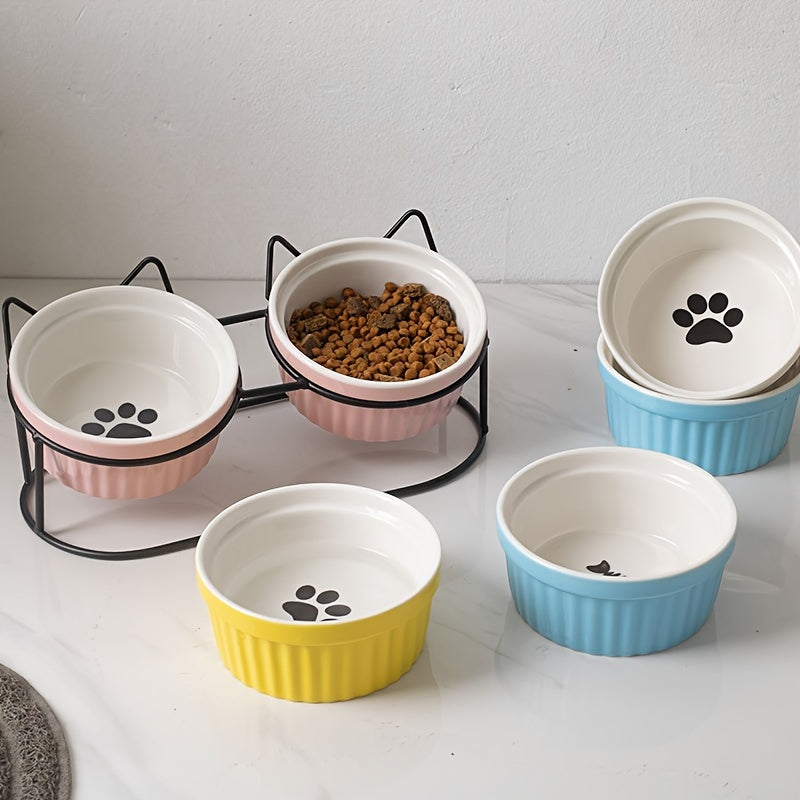 Set of non-slip ceramic cat food and water bowls with iron bracket promotes healthy eating and reduces neck strain.