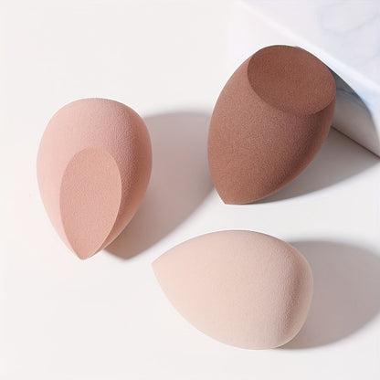 Set of 3 makeup sponges for dry and wet use, expanding egg-shaped cosmetic sponges for foundation and concealer application.