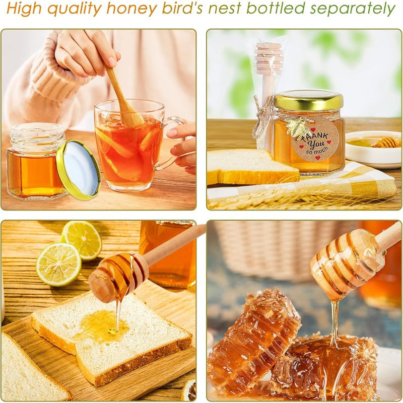 Tiny honey jars with wooden dipsticks, hexagonal glass containers topped with golden lids, embellished with charming golden bee accents, and accented with decorative jute perfect for weddings, baby showers, and party favors.