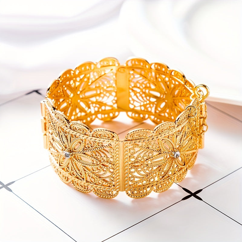 A luxurious gold-plated metal bracelet designed for women's jewelry, perfect for an Arab traditional festival, a bride's wedding ensemble, or as a beautiful wrist accessory.