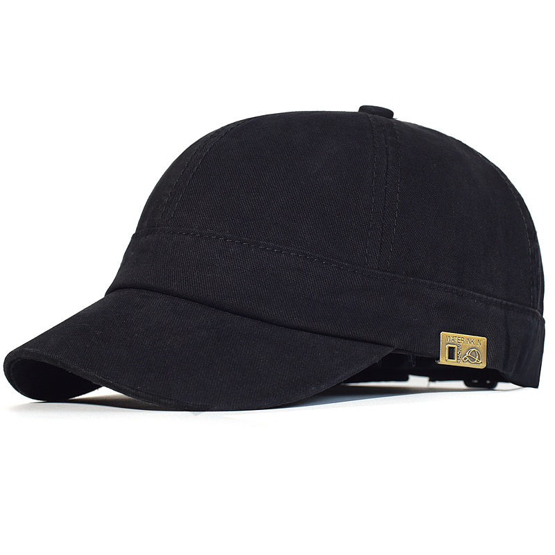 Soft vintage dad hat with adjustable low profile fit for men and women. Black with golden logo. Casual trucker style. Hand wash or dry clean.