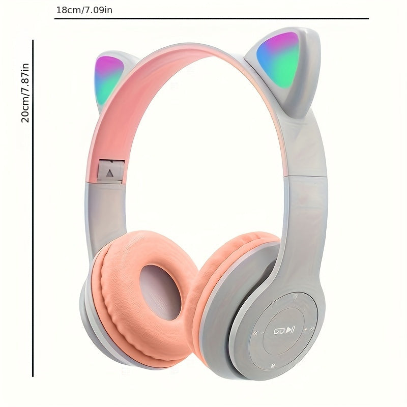 Wireless headphones with cute cat ears, LED lights, mic control. Stereo music helmet for phones and tablets with USB charging, volume control, and 3.5mm jack. Available in multiple colors.