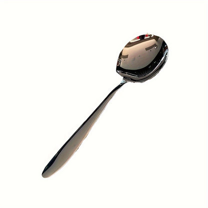 Elegant oversized stainless steel spoon for serving rice, eggs, and more with a shiny, durable finish.