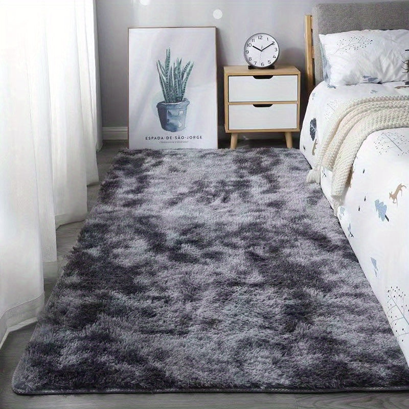 Soft, fluffy shag area rug perfect for living room or bedroom decor. This non-slip machine washable carpet adds luxury and coziness to any space.