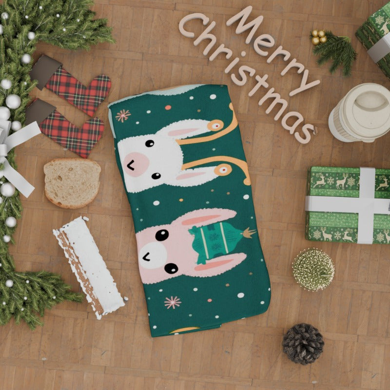 Christmas kitchen towel featuring a snowman and reindeer design, measuring 45.72x66.04 cm. Made from soft polyester in a contemporary style, woven with a rectangular shape. Easy to care for, this machine washable dish cloth is perfect for adding a touch