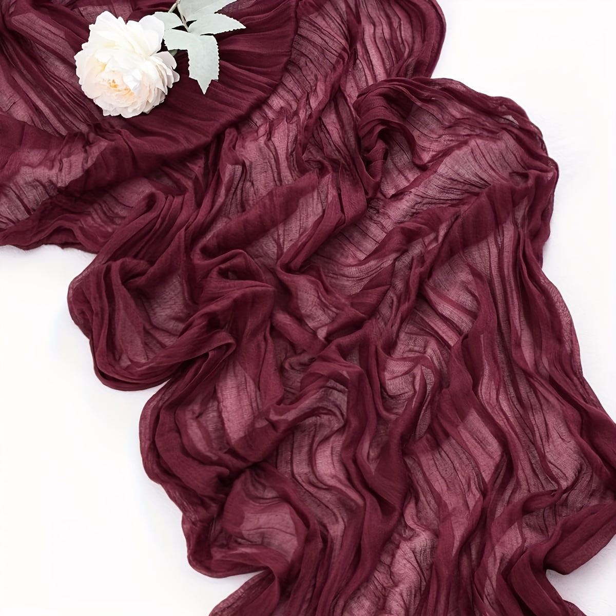 Cheesecloth table runner in burgundy with bohemian country style, ideal for weddings and bridal showers, perfect for Easter and summer table decor.