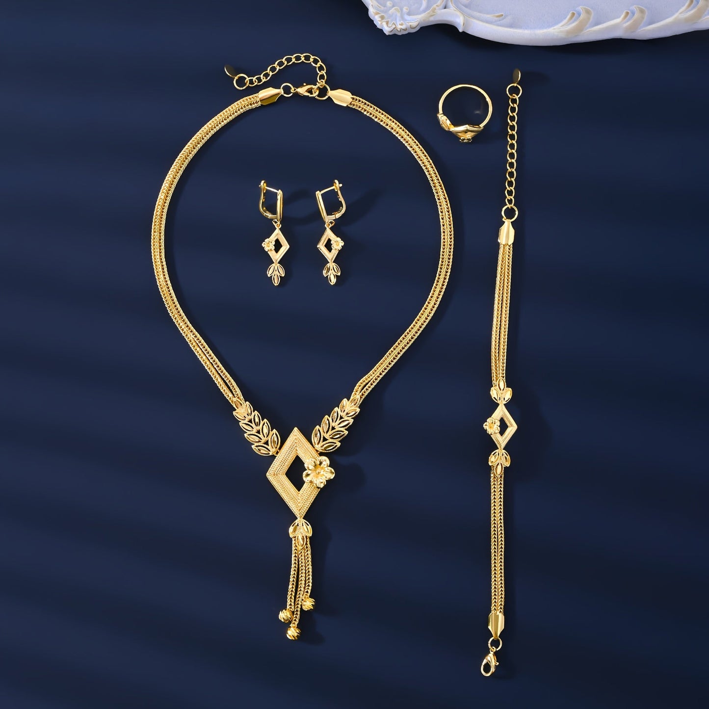 Vintage & Sexy Style 18K Golden Plated Copper Jewelry Set for Women, including Wedding Bridal Necklace, Bracelet, Ring, and Earrings. This all-season set is perfect for daily wear and gift giving.