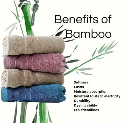 4-Pack of soft and absorbent bamboo hand towels for bathroom with a skin-friendly design featuring a contemporary striped pattern and space theme. Made with 70% bamboo fiber, 18% cotton, and 12% polyester, these towels have a weight of 420gsm and measure