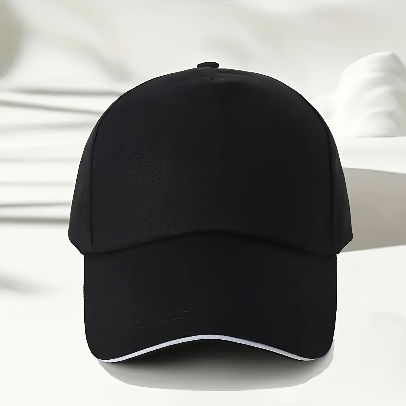 Lightweight polyester sun hat with adjustable drawstring closure for urban summer style.