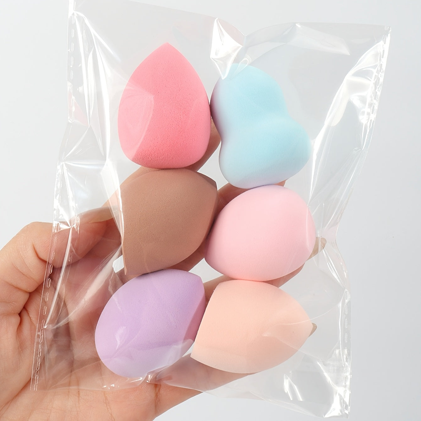 Medium size makeup sponge available in 3, 6, or 12 pieces. Random colors and shapes. Can be used with bb cream, liquid foundation, concealer, blush, etc. Expands when wet. Latex-free.