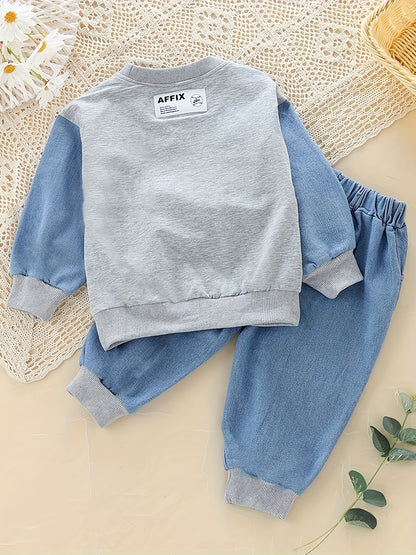 Set of baby's sweatshirt and denim pants in color block design, suitable for toddler and infant boys in spring and fall outdoor activities.