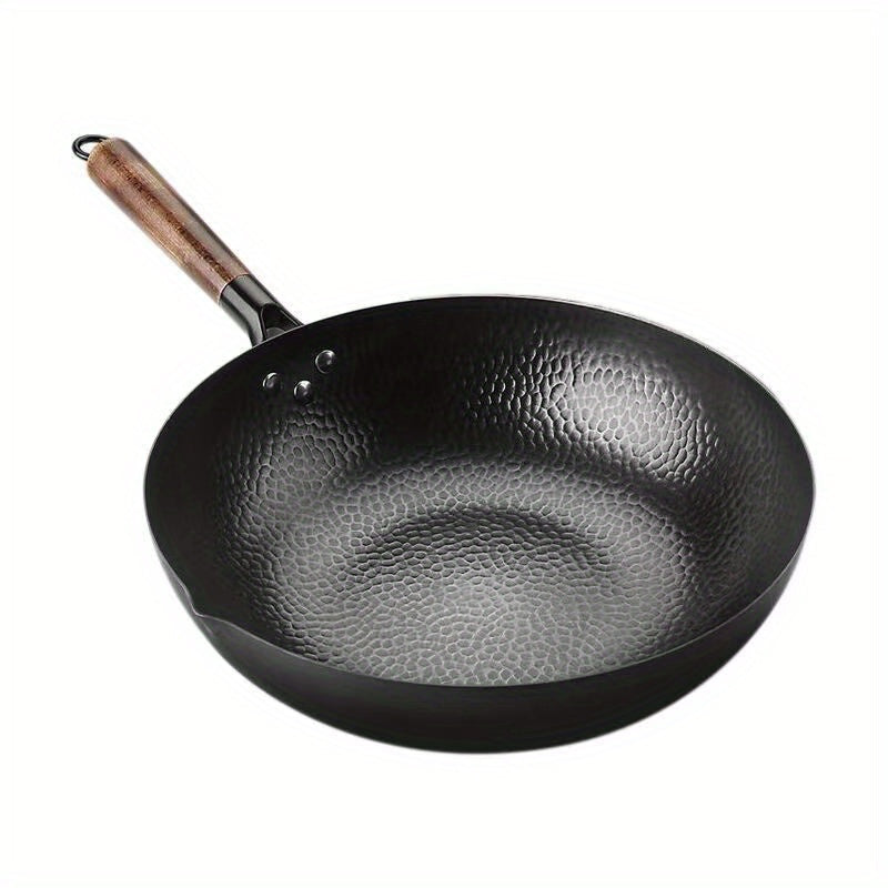 One piece of versatile cookware for all stoves - the Cast Iron Wok (32.0cm). This Stir-Fry Pan is perfect for Chinese style cooking and features a flat bottom for use on induction, electric, gas, and halogen stoves. Complete your kitchen with this