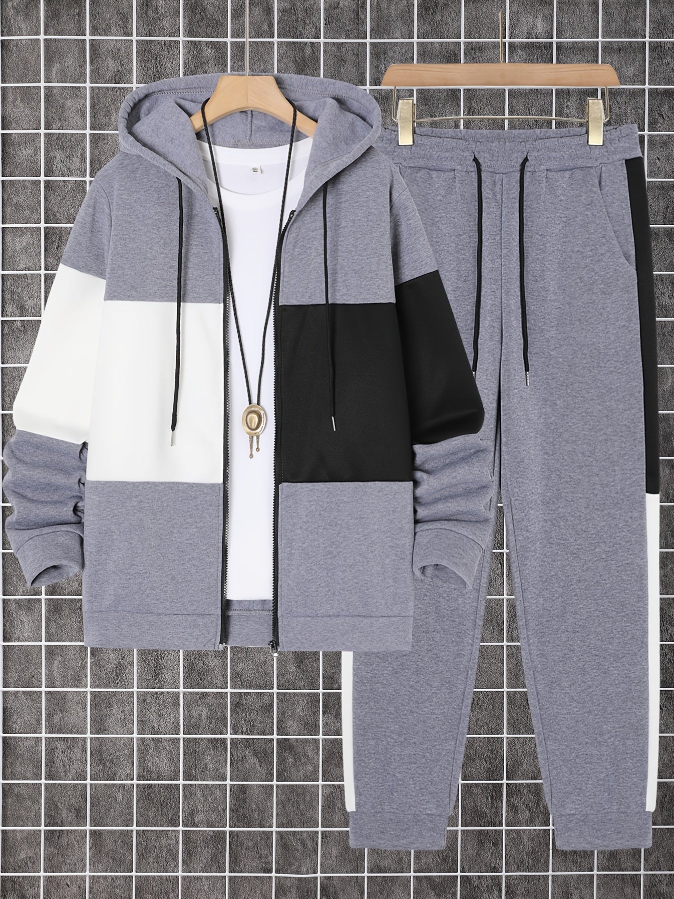 Men's 2-piece color block athletic tracksuit with long sleeve zip up hoodie, drawstring, and jogging pants for gym workouts and running.