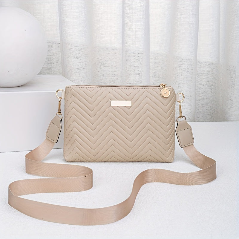 Stylish wave pattern crossbody bag with exquisite hardware and solid color versatility.