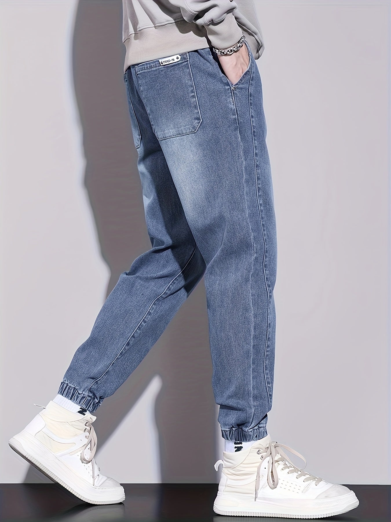 Men's Solid Color Denim Jogger Pants in a casual cotton blend with stretchy fabric, slim fit, washed out look, mid-waist with rope closure, regular fit for youth fashion. Suitable for all