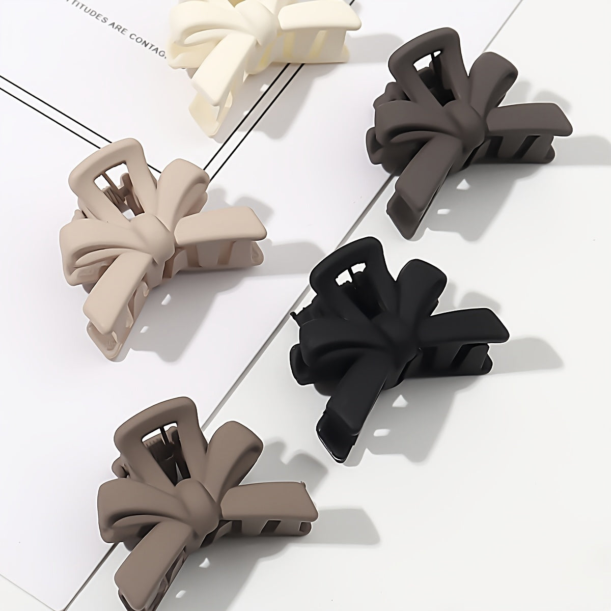 5 small 2.7cm frosted black hair clips with bow design, durable plastic, versatile for princess hairstyles.