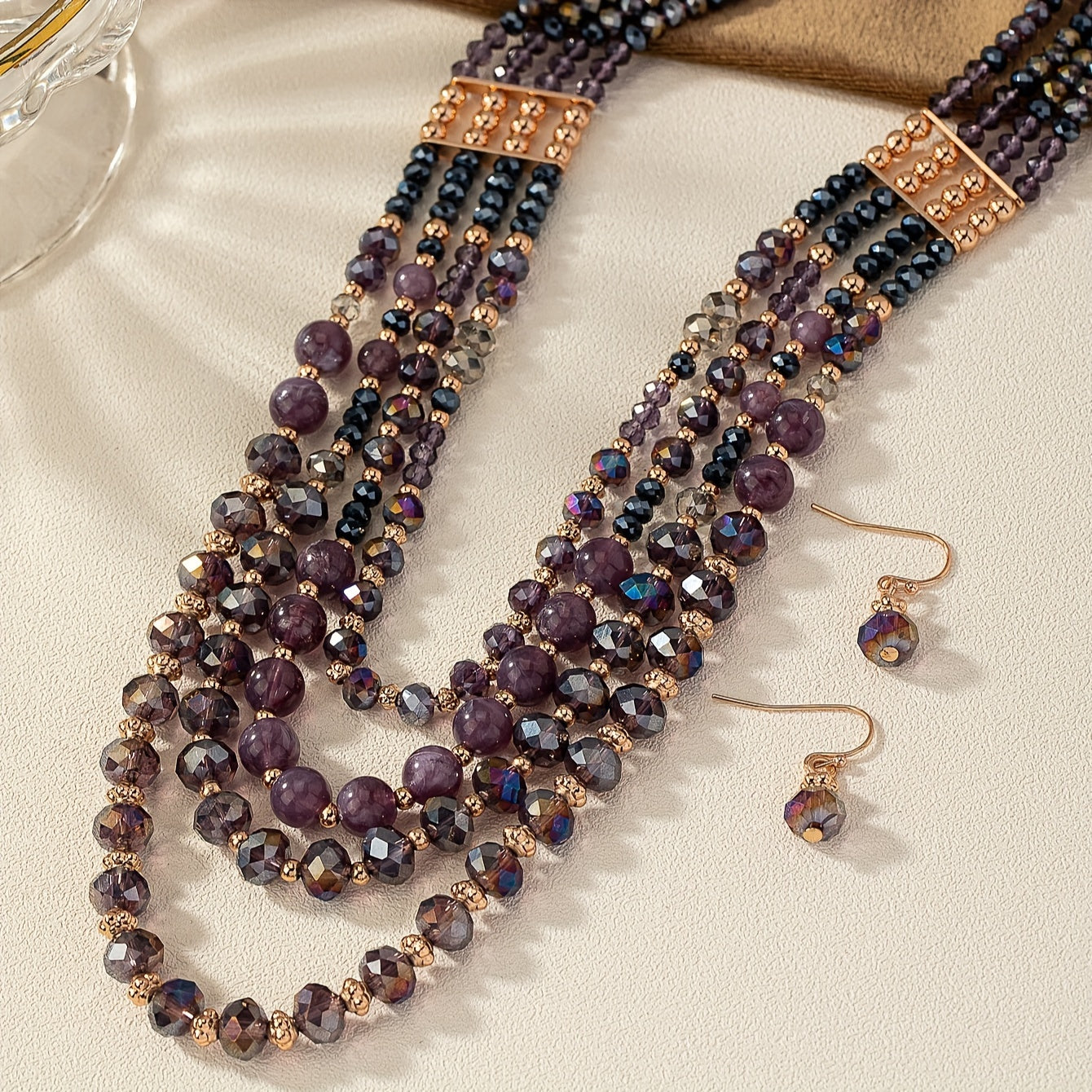 Luxurious and elegant, this Purple Series Beaded Necklace Set exudes style and sophistication. Featuring multiple layers, it is perfect for stacking and adds a touch of glamour to any woman's jewelry collection.