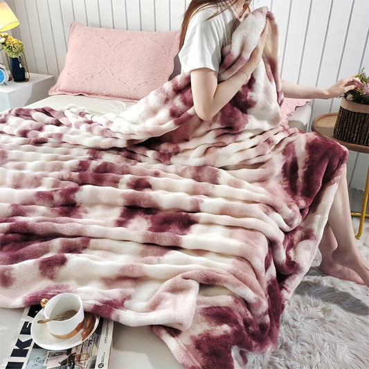 Modern soft faux rabbit fur bed blanket with a tie-dye plush flannel design, featuring a thick dual layer for ultimate coziness in all seasons. Made of machine washable polyester in a rainbow moire pattern, perfect for the sofa, living room, or bed.