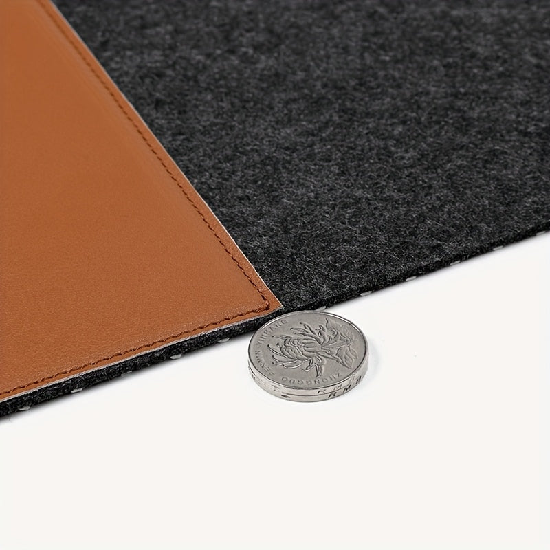 Large gaming mouse pad with anti-slip felt and faux leather, suitable for e-sports, writing, and office use. Includes wrist support and keyboard pad.