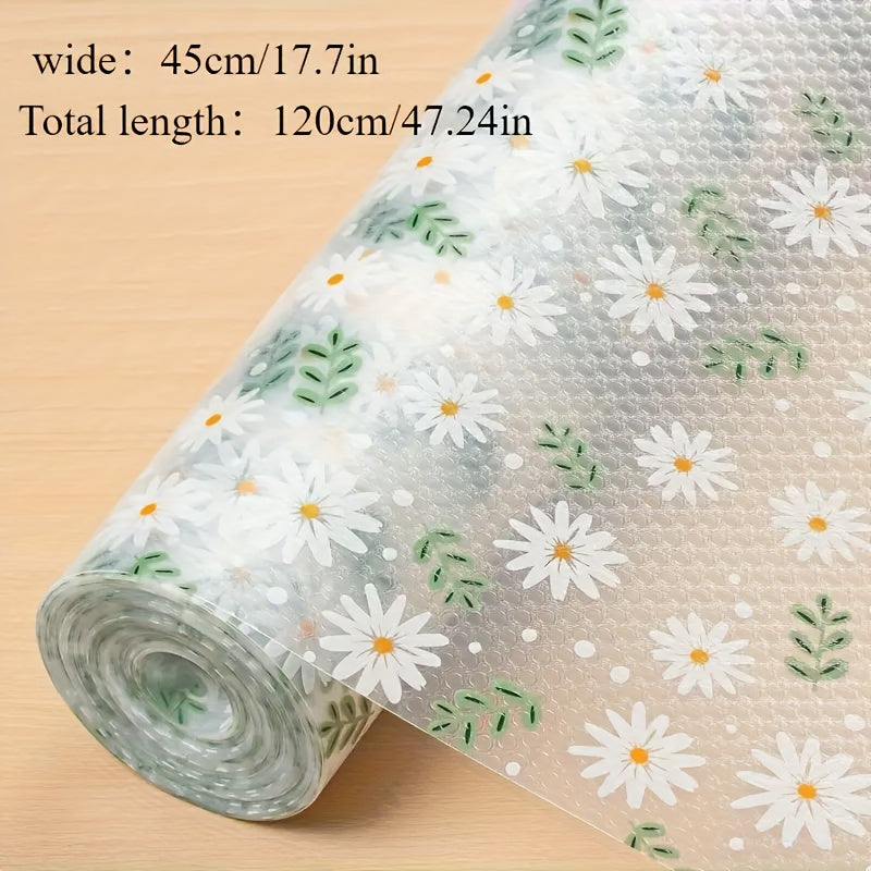 Modern floral pattern EVA shelf liner in daisy print. This non-adhesive, non-slip drawer mat is made of durable rubber and is perfect for protecting cabinets in the kitchen, refrigerator, or desk storage.