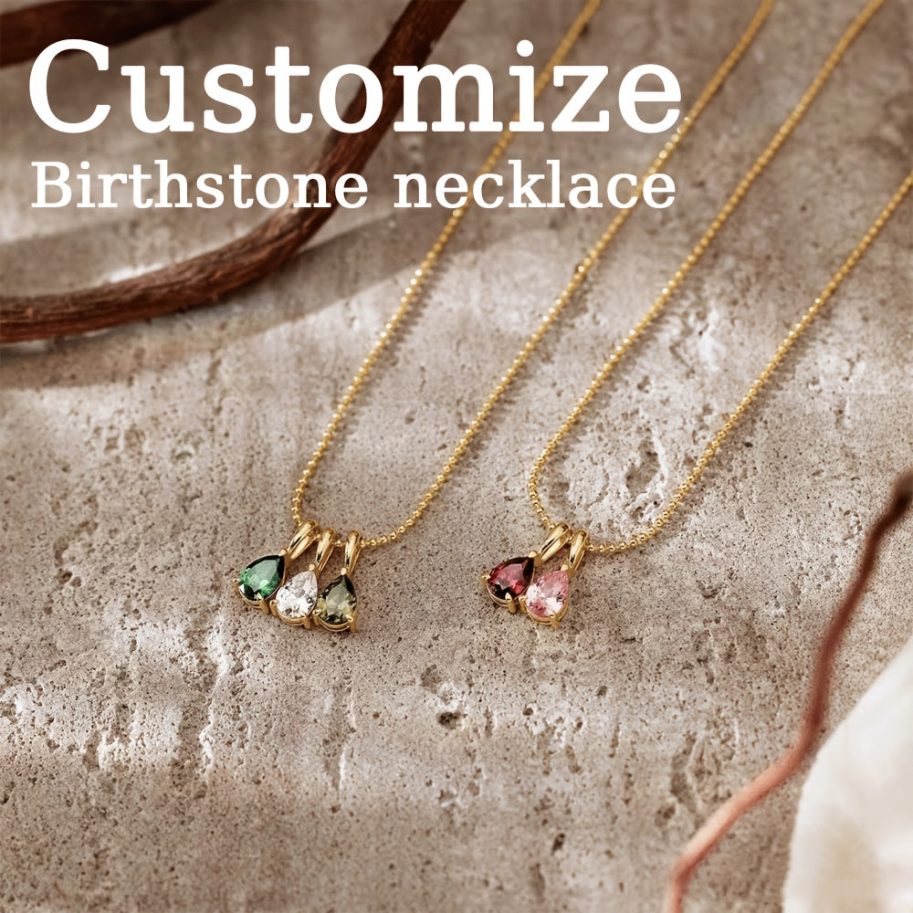 Customize your own Birthstone Necklace with up to five birthstones, plated in 18K gold. Enter the month in Arabic numerals for a personalized touch. This necklace makes a perfect gift for her, mom, or girlfriend for Christmas, Valentine's Day, or an