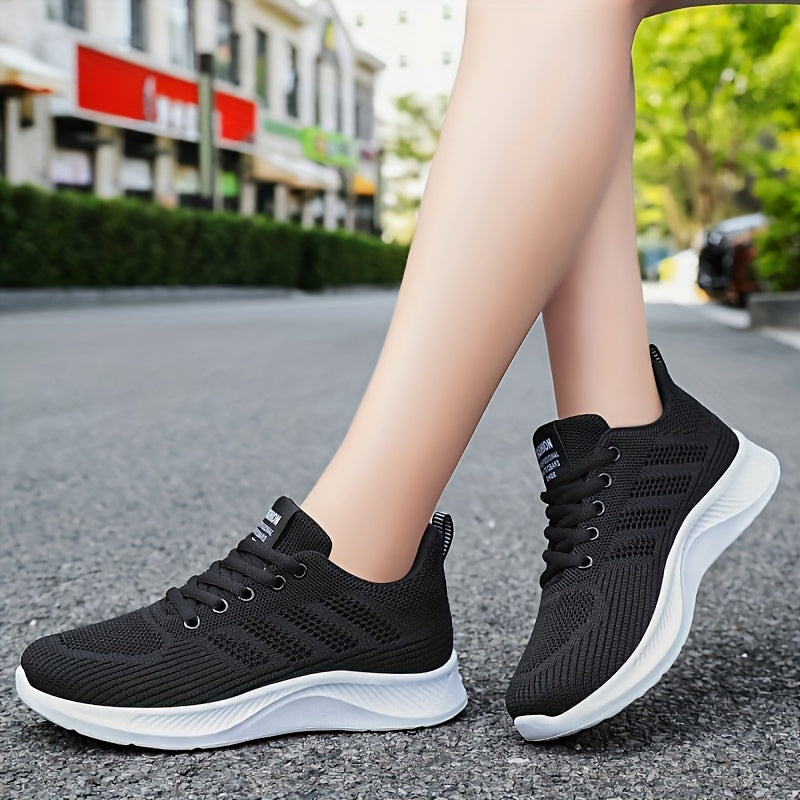 Women's breathable running sneakers with lightweight design, lace-up closure, comfortable fabric, PVC sole, and round toe for outdoor training.