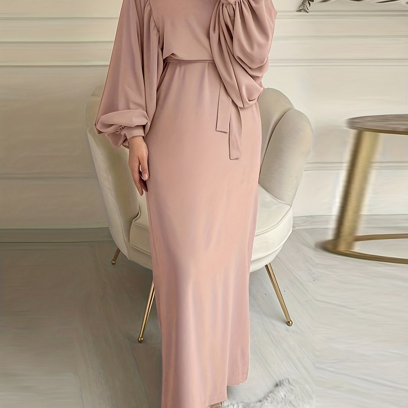 Elegant maxi abaya dress with solid tie waist and lantern sleeves.