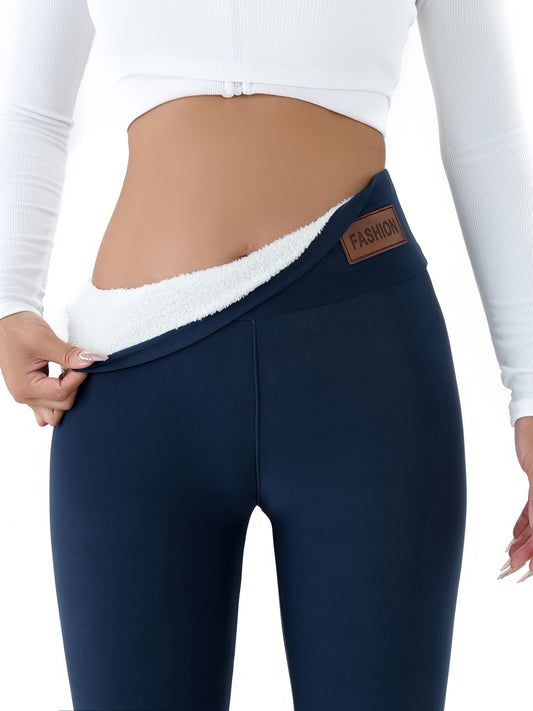 Cozy women's sportswear with tight body warmer and comfortable tights for autumn and winter.